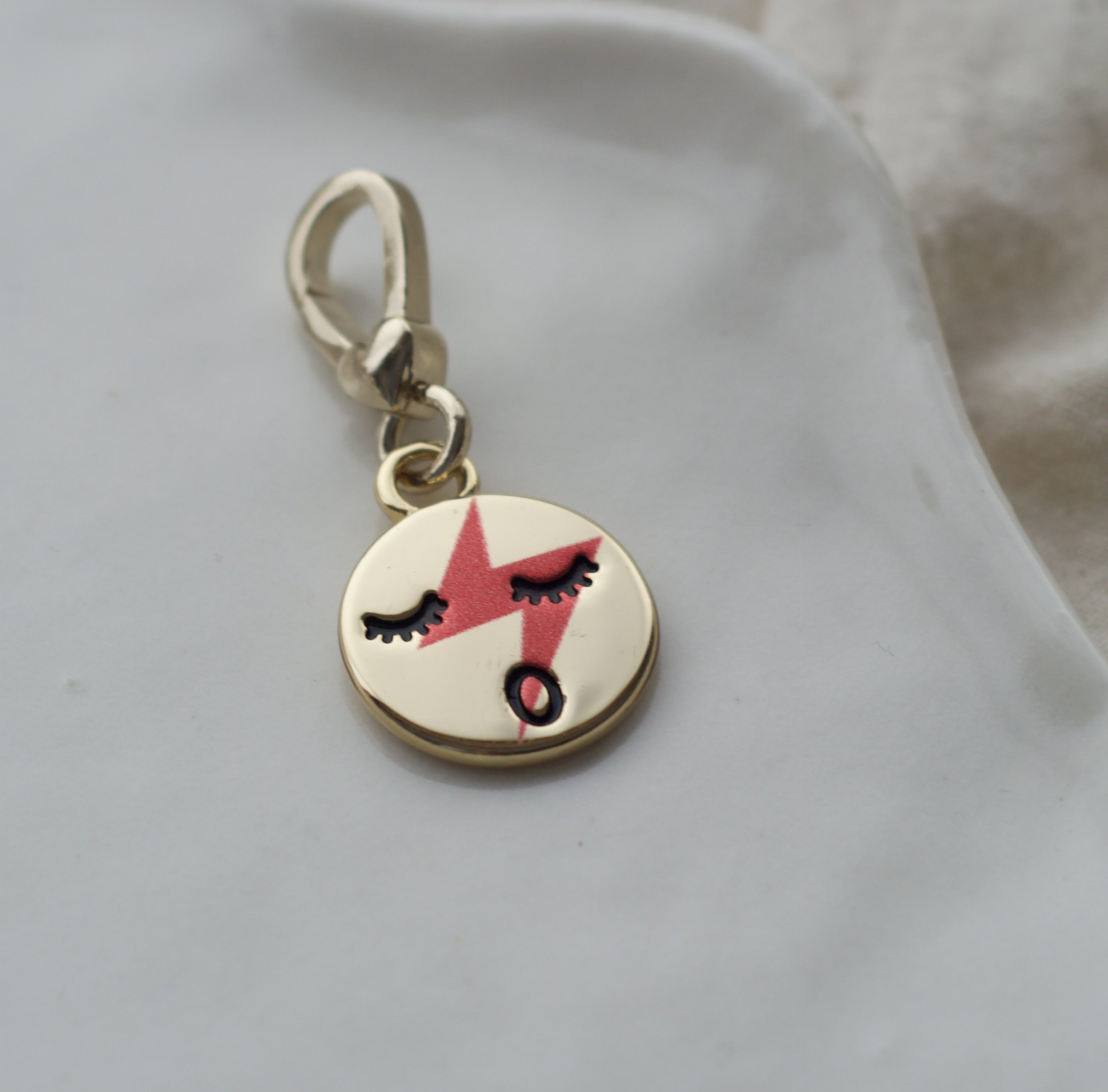 Lightening Face Earring In Gold Tone